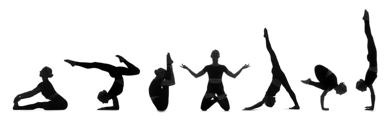 Silhouettes of young women practicing yoga on white background