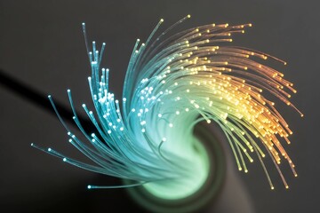 Bright Fiber Optic Strands Swirling with Blue and Orange Light Technology