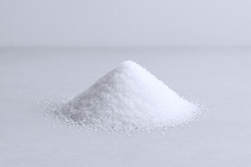 Pile of White Powder Isolated on White Background, perfect for cooking ingredients and health