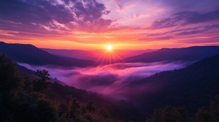 Fototapeta premium Mountaintop sunset concept. Majestic sunrise over misty mountains with vibrant clouds and hues.