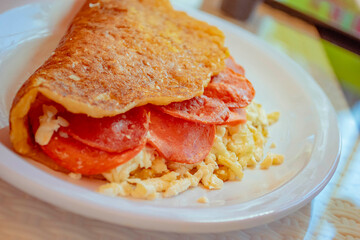Venezuelan cachapa pepperoni and cheese