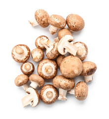 Heap of fresh champignon mushrooms isolated on white background, closeup