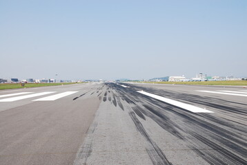 Fototapeta premium Runway Tire Marks and Threshold Markings
