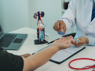 A young man visits a doctor about an enlarged prostate, focusing on the hands and other organs....