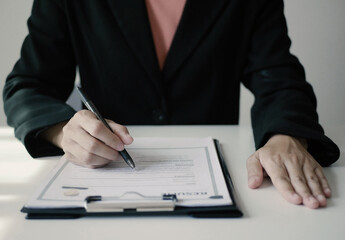 Businesswoman employer holding resume, recruiting, planning, evaluating and reviewing resume of job applicant, recruiting new employees, recruitment concept