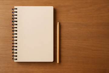 Top view of a blank spiral notebook and wooden pencil on a dark wood desk, concept for writing, studying, or planning