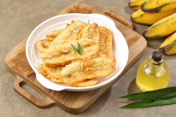 Pisang Goreng. Fried bananas are a snack that is often found in Indonesia, Malaysia, India and Singapore. This food is made from bananas that have been peeled