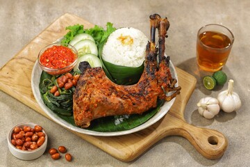 Ayam Bakar Taliwang is a spicy grilled chicken dish typical of Taliwang, Lombok, West Nusa Tenggara (NTB) which is made from young free-range chicken which is grilled and coated with a special spice-r