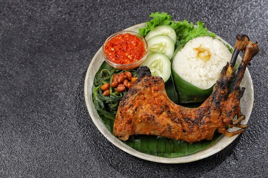 Ayam Bakar Taliwang is a spicy grilled chicken dish typical of Taliwang, Lombok, West Nusa Tenggara (NTB) which is made from young free-range chicken which is grilled and coated with a special spice-r