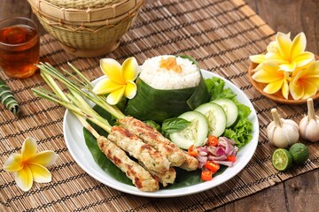 Sate Lilit is a variant of satay from Bali. This satay is made from pork, fish, chicken or beef, then mixed with grated coconut, coconut milk, lime, shallots and pepper.