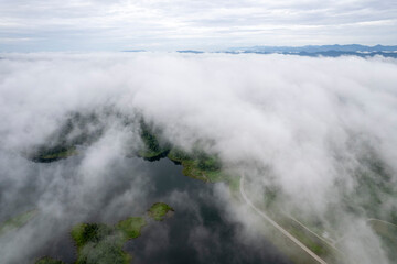 Landscape of Morning Mist with Mountain Layer. mountain ridge and clouds in rural jungle bush forest
