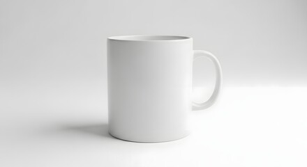 Obraz premium Plain white ceramic mug, handle, studio shot, blank, simple, clean design.
