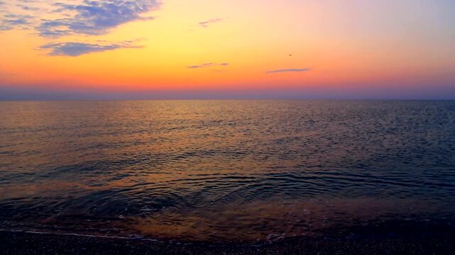 Beautiful summer sunrise over the beach