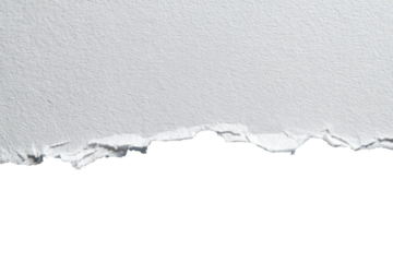 Ripped white paper edge against black background