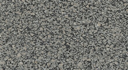 A closeup photograph of a granite surface It shows a mottled pattern of light gray dark gray and beige grains