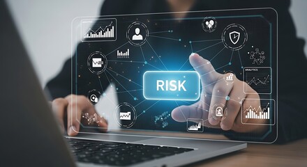 Businessman interacting with futuristic digital interface displaying risk management strategy