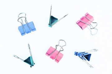colorful paper clips on a white background