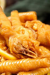 Golden Braised Chicken Feet with Glossy Sauce - Traditional Asian Delicacy Close-up