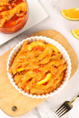 Spicy boneless chicken feet claws with lemon garnish fresh Asian delicacy cuisine appetizer phoenix style