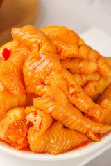 Fresh Boneless Chicken Feet in Spicy Sauce Closeup - Traditional Asian Food Delicacy