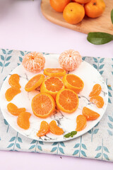 Fresh Orange Slices from Guangxi Sihui China on Marble Plate - Sweet Citrus Fruit Arrangement