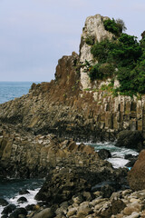 Jusangjeolli Cliff Columnar Joints and sea in Jeju Island, Korea.