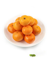 Fresh Mandarin Oranges in White Bowl on Clean Background with Mint Garnish