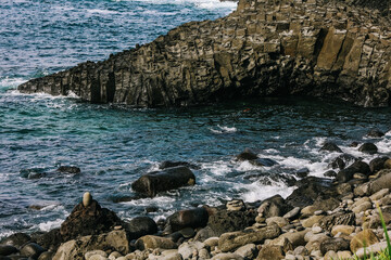 Jusangjeolli Cliff Columnar Joints and sea in Jeju Island, Korea.