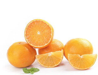 Fresh Ehime Oranges Sliced and Whole with Mint on White Background