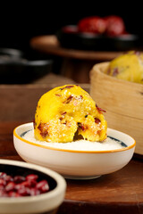 Golden steamed buns with red dates and sweet filling ready to eat traditional Asian dessert