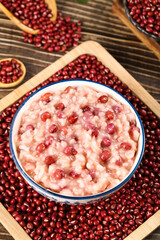 Red Bean Barley Porridge with Adzuki Beans on Wood Background - Healthy Grains Wellness Food