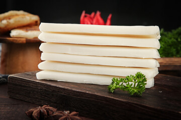 Fresh Rice Paper Sheets Stacked on Wooden Board for Asian Cooking and Spring Roll Preparation