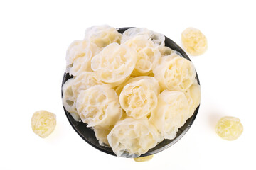 Fresh lotus root slices in bowl - healthy Asian vegetable ingredient with natural holes and crisp texture