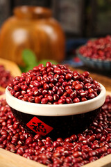 Red Adzuki Beans in Traditional Bowl with Chinese Characters for Healthy Cooking and Porridge Making