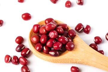 Nutritious Red Beans in Wooden Spoon - Healthy Legumes for Congee and Traditional Northeastern Cuisine on White Background