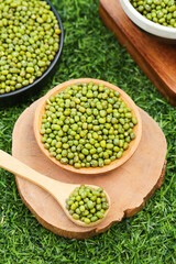 Fresh Green Mung Beans in Wooden Bowls on Grass - Healthy Vegetarian Protein Legumes
