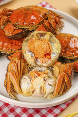 Fresh Steamed Hairy Crabs Closeup - Premium Seafood Delicacy with Orange Shells and Creamy Meat