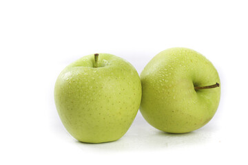 Fresh Green Apples with Water Droplets Closeup on White Background