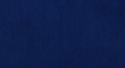 A closeup of dark blue fabric with a fine textured weave