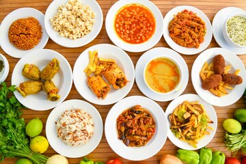 Delicious meat kebab with fresh vegetable salad served with variety of Turkish dishes and appetizers. Top view of assorted Turkish food and meze, tasty and healthy Mediterranean cuisine. Top view.