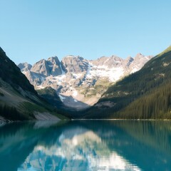 Fototapeta premium Turquoise mountain lake reflecting snow capped peaks and evergreen forests under a clear blue sky
