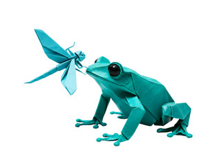 Turquoise Origami Frog Reaching for a Dragonfly Against Black Background Isolated