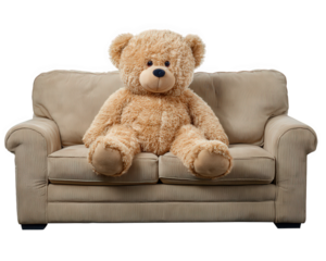 Teddy bear plush toy beige sofa home decor living room soft cute cozy relaxation childhood memory. large plush teddy bear sits on beige fabric sofa creating cozy and inviting home decor element