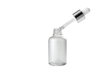Clear glass bottle with dropper resting on surface, showcasing minimalist design and neutral tones for cosmetic or medical use
