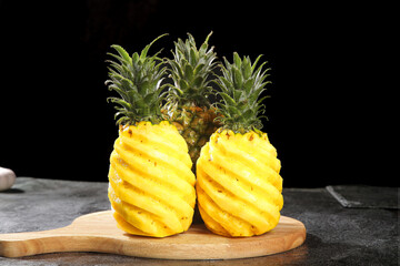 Fresh Cut Pineapples with Spiral Pattern on Wooden Board - Zhanjiang Xuwen Tropical Fruit