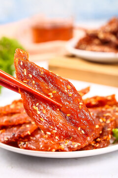 Spicy Dried Fish Jerky Snack with Honey Glaze and Sesame Seeds