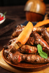 Sichuan Braised Chicken Feet with Ginger - Traditional Chinese Comfort Food on Wooden Plate