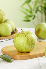 Fresh Jinshai Green Apples from Shandong on Wooden Board - Healthy Organic Fruit