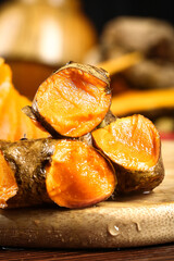 Fresh Turmeric Root Slices on Wooden Board - Natural Spice Seasoning Ingredient