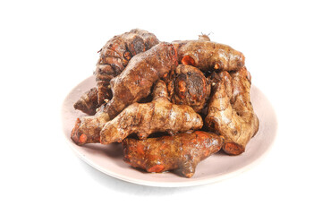 Fresh Sichuan Turmeric Roots on White Plate - Organic Golden Spice Ingredient Grown by Local Farmers